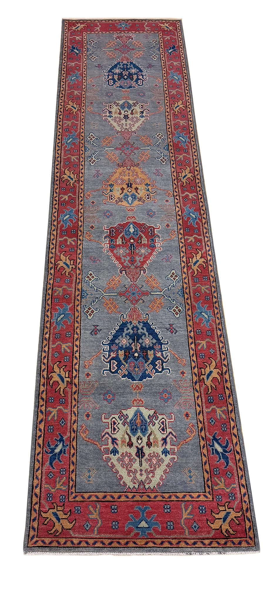Persian Caucasian S875 2'8" x 11'10" hand knotted: No Reserve Kazak D875 2'8"x11'10" this is runner displays a traditional Persian-inspired geometric design featuring a series of diamond and medallion motifs arranged symmetrically along its rich silve