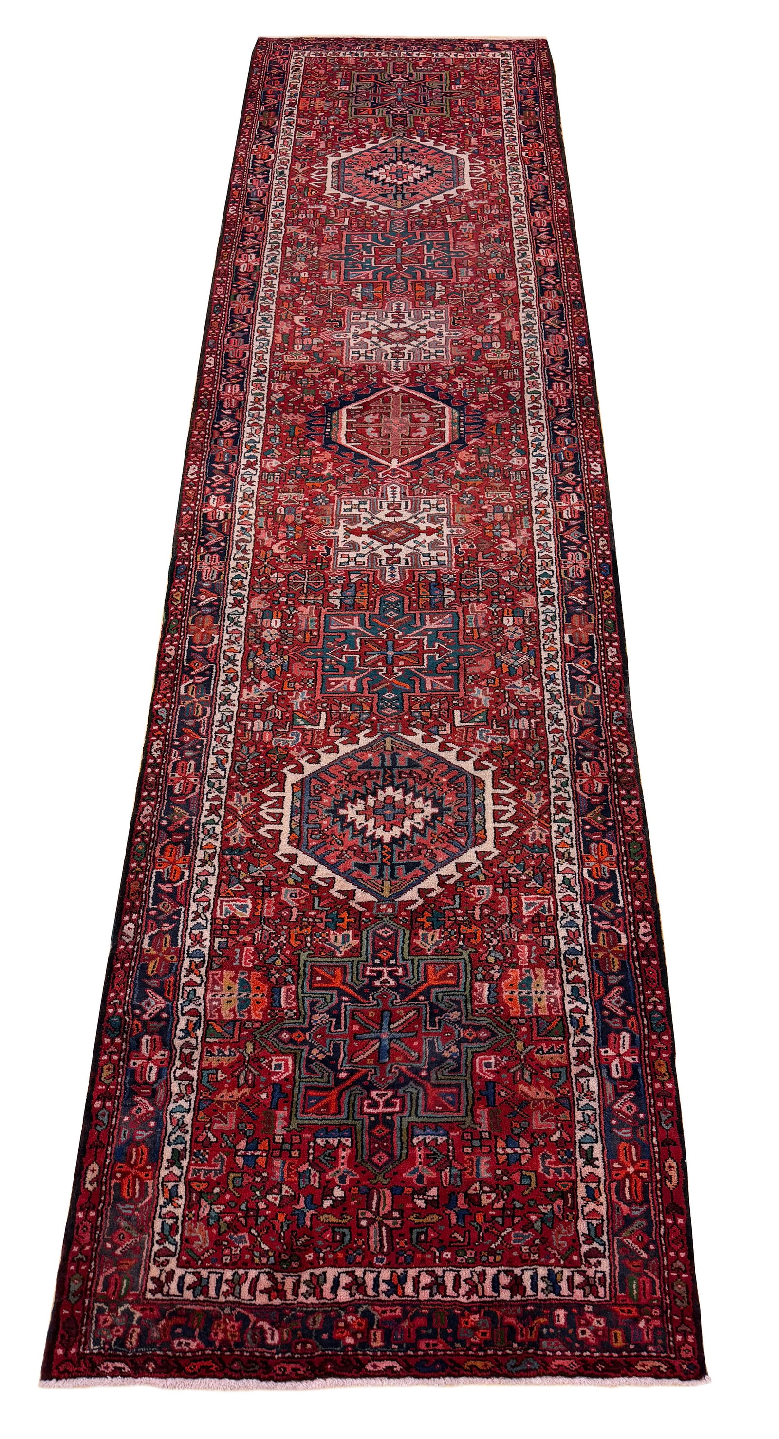 Persian Heriz S795 3'11" x 14'8" hand knotted in Iran: No Reserve Heriz S795 wool runer, antique hand-knotted in Iran, 3'11"x 14'8" in very good condition.This tribal Heriz runner exemplifies the bold geometric patterns and fine craftsmanship of Persian w