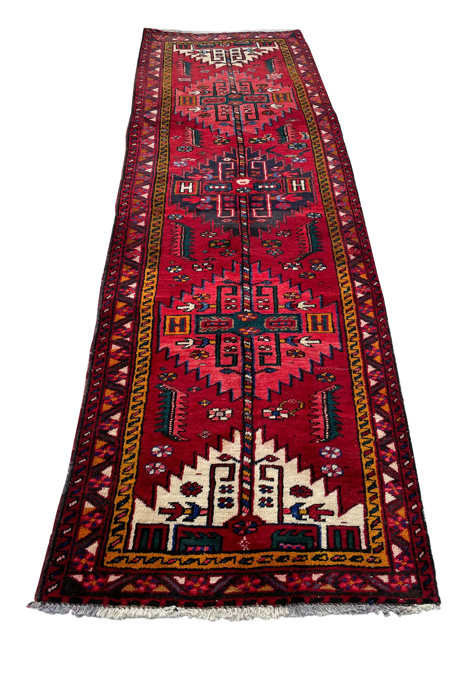 Persian Heriz 4488 3'2" x 10' vintage runner hand-knotted in Iran: No Reserve Persian Heriz 4488, 3'2"x10' wool runner, hand-knotted in Iran in the 1960s and in very good condition (see photos). This tribal Heriz runner exemplifies the bold geometric patterns and fin