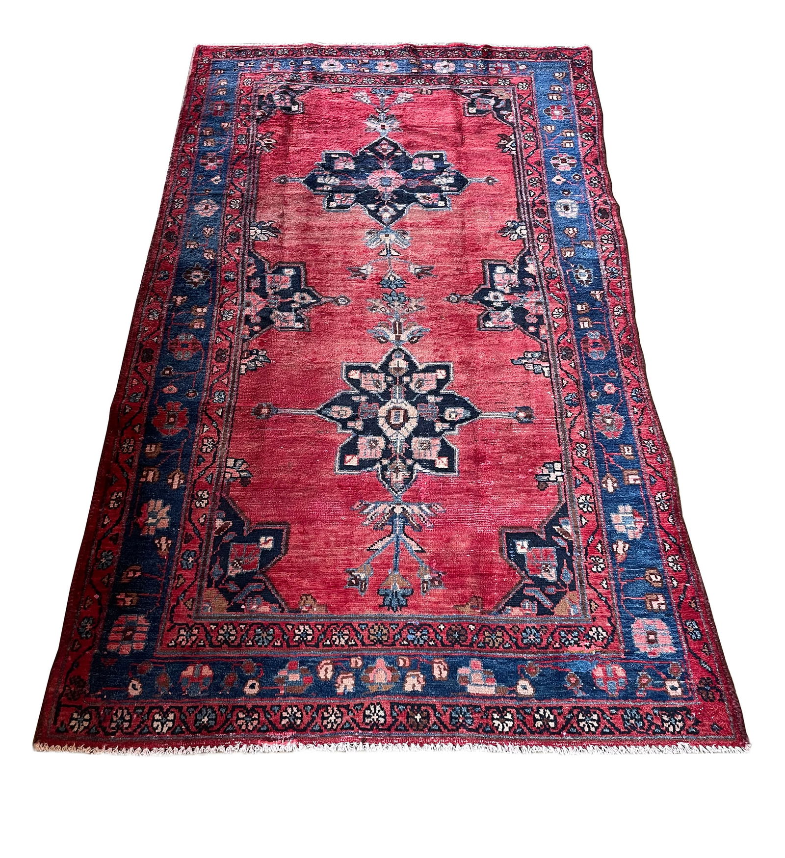 Persian Mahal 1013 4'3" x 7'6" vintage wool runner hand knotted in Iran: No Reserve Mahal 1013 This 4'3" x 7'6"runner showcases a striking traditional Persian design with a bold and vibrant color palette. The rich red field is adorned with a series of central navy blue med