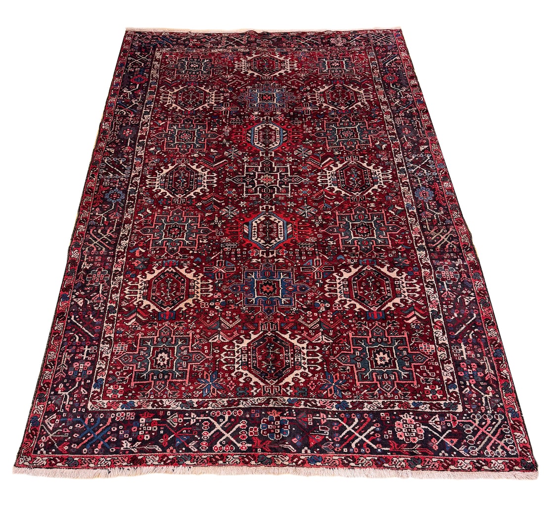 Persian Heriz S794 7'8" x 11'3" hand-knotted in Iran: No Reserve Persian Heriz S794, antique 7'8"x11'3", wool rug, hand-knotted in Iran and in very good condition, retail value $15,000-$20,000 (see photos). This tribal Heriz rug exemplifies the bold geom
