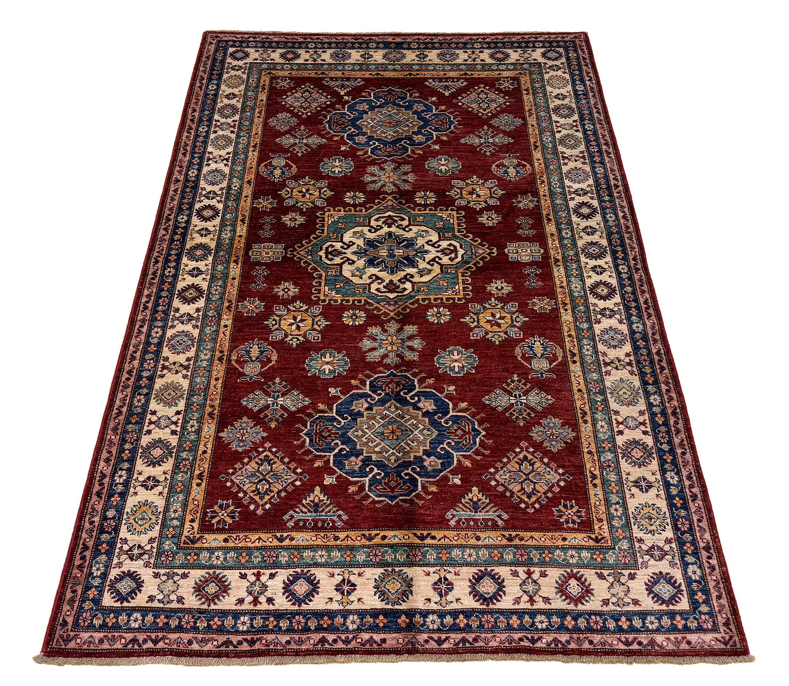 No reserve Kazak D204 in perfect condition. 5'5"x8': No reserve Kazak style D204 in perfect condition. 5'5"x8' Unusual design colors with beautiful rich colors. Rare quality. Retail value $15,000-$20,000 (see photos)This rug features a classic Kazak des