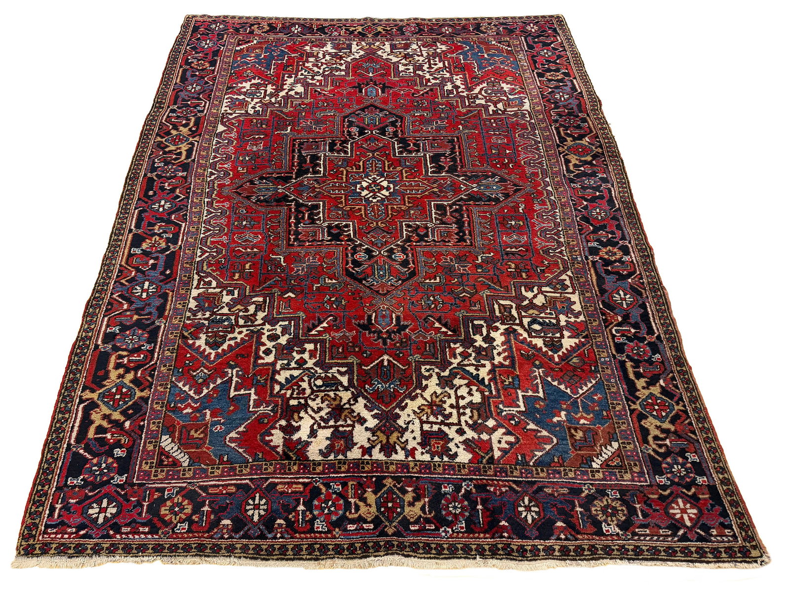 Persian Heriz antique S878 8'5"x11'5" hand-knotted in Iran: No Reserve Heriz antique S878 Size 8'5"x11'5" 1930's This rug exemplifies the beauty and prestige of a traditional Persian Heriz design, celebrated for its bold patterns and masterful symmetry. Made f