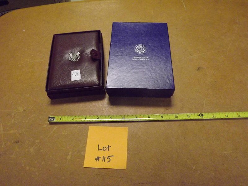 TWO US COIN SETS: 1986 US MINT PRESTIGE SET AND 1984 US MINT OLYMPIC PRESTIGE SET BOTH IN ORIGINAL DISPLAY CASES AND BOX