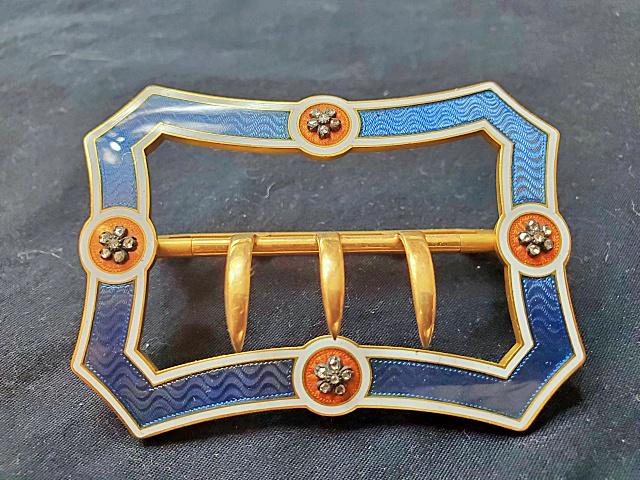 Vintage Ladies Belt Buckle with Rhinestones: Vintage Ladies Belt Buckle with blue and white enamel and Rhinestones flowers. Measures about 2.75inches by 2 inches. Metal frame appears to be brass, the bar with prongs is magnetic.