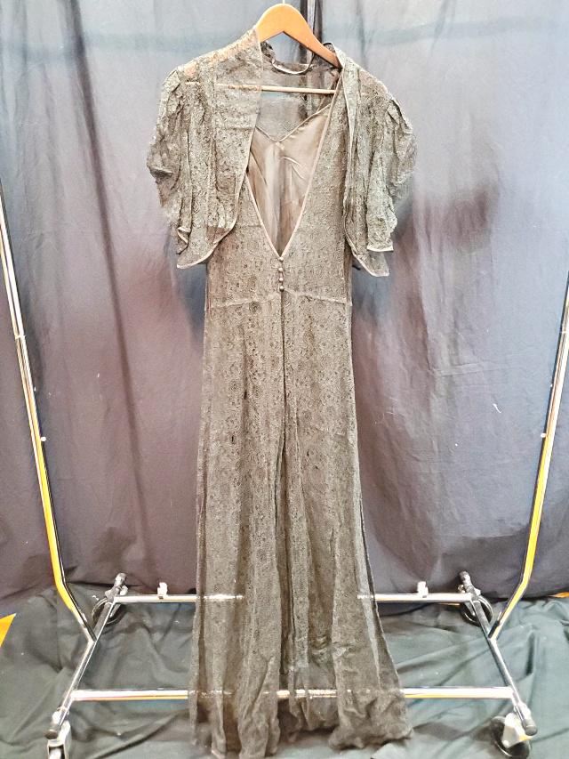 Vintage Black Negligee with Lace: Vintage Black Lace Negligee with satin like shell, and a small lace cape. In fair condition, lace is fragile and starting to split in some areas. In house Flat Rate Shipping of $15 is a domestic shipp