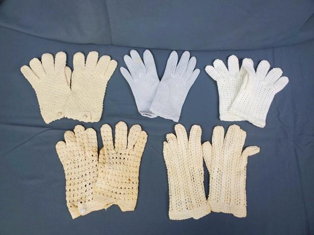 Group of 5 Vintage Pairs of Gloves - Crocheted: Group of 5 Vintage Pairs of Gloves including 4 that are hand Crocheted and 1 in a silver lame. They all appear small in size, though one is sized Medium. Three have tags from Italy. Condition is good,
