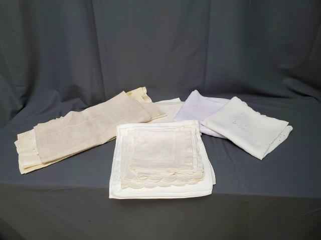 Vintage Linen Grouping - Napkins and Towels: Vintage linen grouping includes a small breakfast cloth with hand embroidery and eyelets in good condition, a few marks. A set of 11 organdy napkins in very good condition. A set of 12 linen damask na