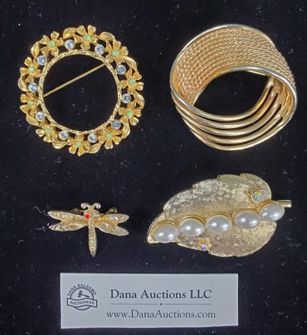 4 Vintage Signed Pins - Boucher, Coro, Rafaelian: Four vintage signed pins or brooches. Includes a Rafaelian gold tone flower wreath pin green and clear rhinestones, 1.75 inches diameter, in very good condition all stones present. A gold tone Boucher