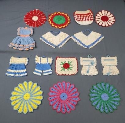Group of 15 Vintage Crocheted Pot Holders: Group of 15 Vintage Hand Crocheted Pot Holders or Trivets including flowers, little dresses, little panties, and a little bag. All are in good used condition with some spots. We do our best to describ
