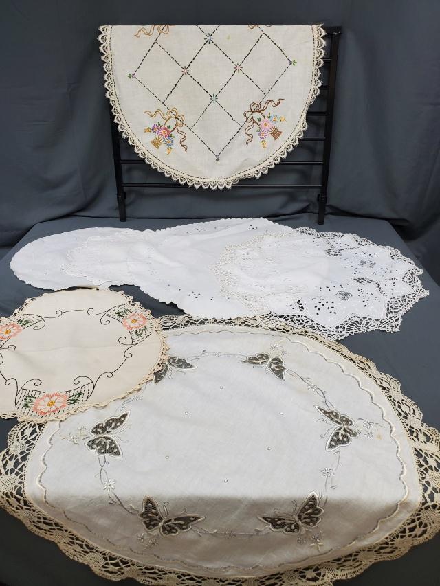 Vintage Lace and Crocheted Doily Group - F: Group of 7 Vintage Lace and Crocheted Doilies on the larger side, including hand embroidered with machine lace edge, 26 inch dia, with a water spot, a hand embroidered with hand crocheted edge, a beau