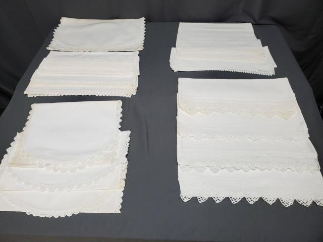 Group of White Vintage Dresser Scarves Crotchet Edge -1: Group of 14 white linen and cotton dresser scarves or table runners of various lengths and widths, with hand crocheted edging, several sets, in good to very good condition with some spots and storage