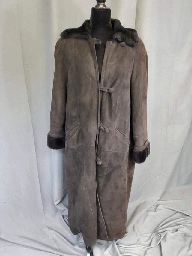 Vintage Suede Leather Coat with Faux Fur Collar: Vintage black suede leather coat with faux fur collar and cuffs by Clifford Michael, size petite small, measures 50 inches long, 16 inches across the shoulders, and 26 inch long sleeves, tag say made 