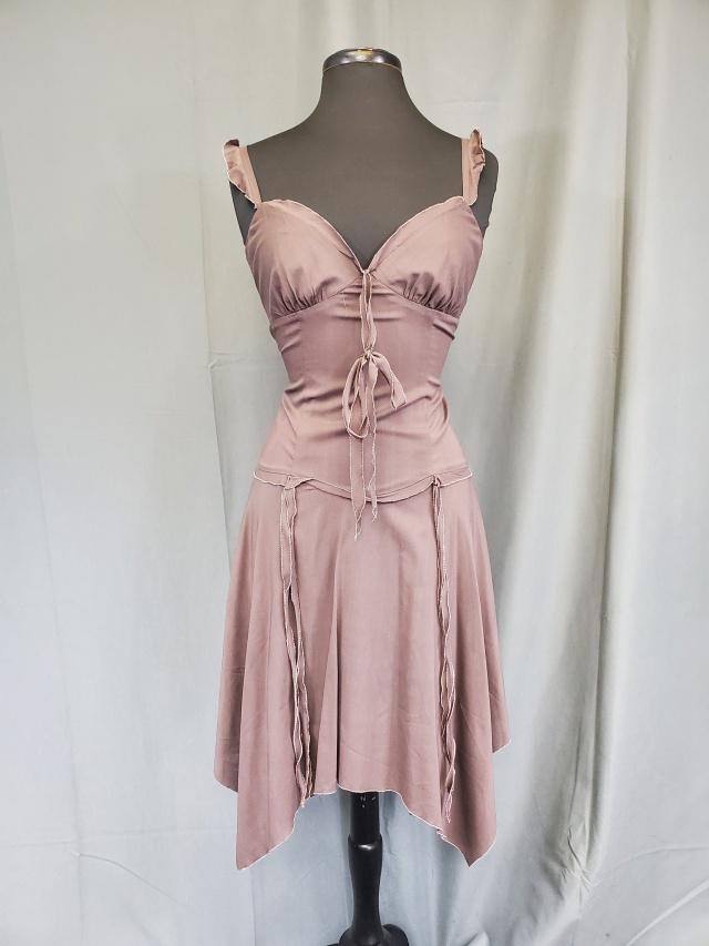 Nicole Miller Silk Dress - Sz 0: Nicole Miller little brown silk dress with pink thread finished edges. Handkerchief cut skirt, sweetheart bodice, and little ruffles on the straps. Little ties embellish the waist and neck line. Tagge