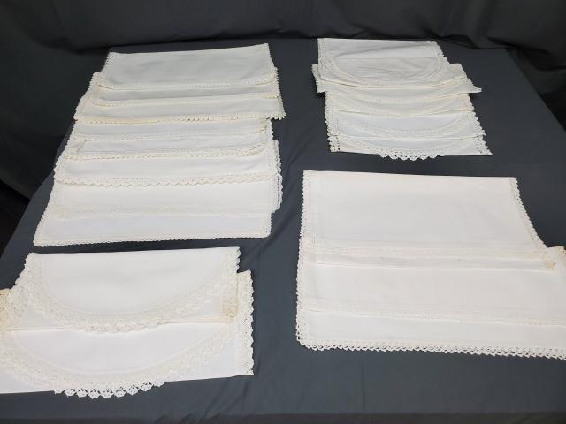 Group of White Vintage Dresser Scarves Crotchet Edge: Group of 19 white linen and cotton dresser scarves or table runners of various lengths and widths, with hand crocheted edging, several sets, in good to very good condition with some spots and storage