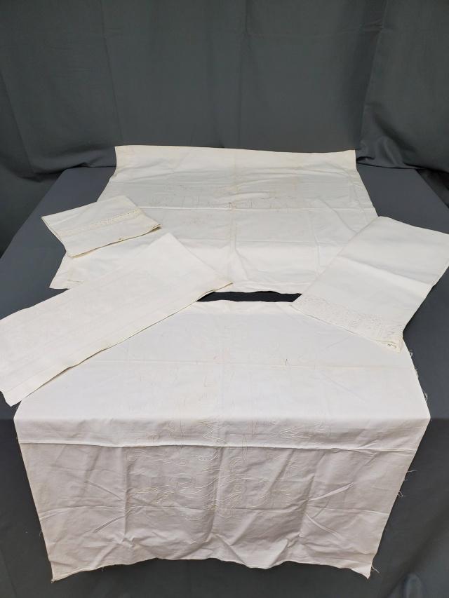 Red Work Pillowcases and More: Two antique redwork pillowcases, one with Dream, the other with Slumber. Both is fair condition, faded and storage discolorations, and Slumber is missing the back. Also includes a small pillowcase wit