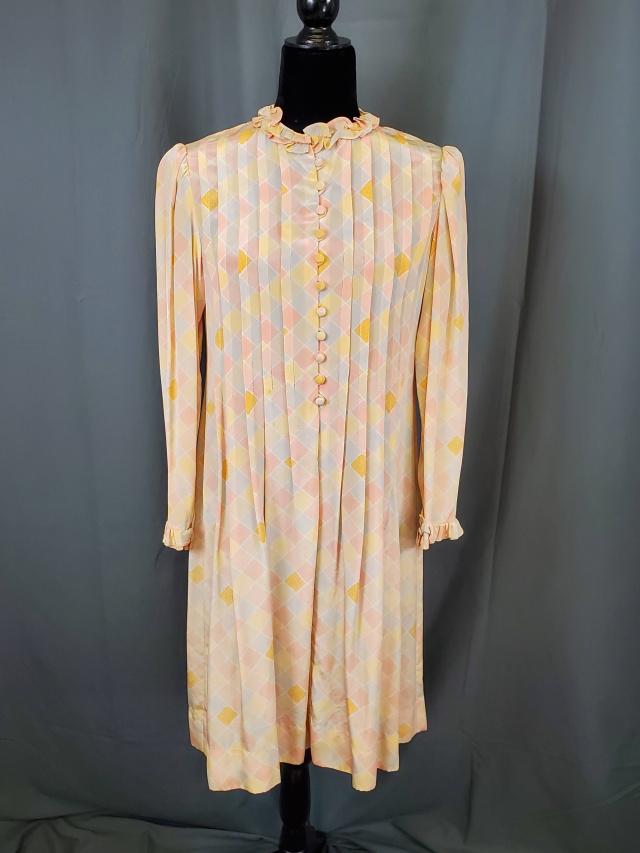 Vintage Pleated Albert Nippon Dress: Vintage Albert Nippon dress, ruffled collar, pleated front and back, button down front, slight puff to sleeves, slight ruffle at cuffs, feels like a silk or similar material, no size but measurements 