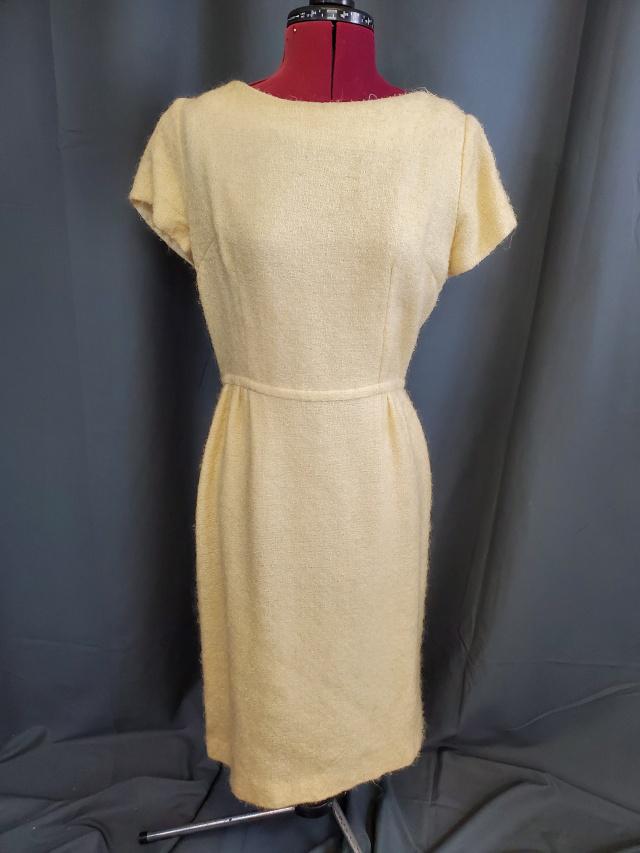 Vintage Ivory Cream Sheath Dress: Vintage c1960s vintage cream colored sheath dress in a knubby woven material. No tags. Metal back zipper. In very good condition. Measurements while laying flat 18" bust, 14" waist and 25 inches long 