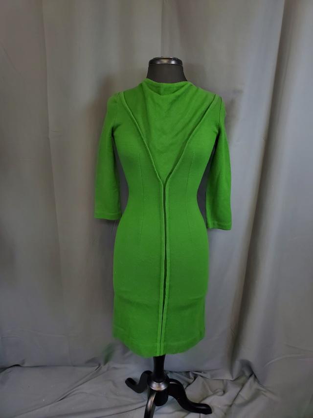 Vintage Green Sweater Dress: Vintage Green Sweater Dress, probably c1980s. Has a zipper in the back. In very good condition. Measurements while laying flat 16" bust, 13" waist, and 22" long from waist to hem. We do our best to de