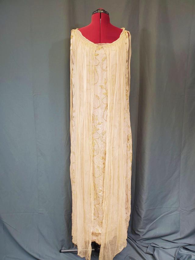 Antique Silk Chiffon and Gold Embroidered Dress: Antique Silk Chiffon and Gold Embroidered Dress. Probably c1920, sleeveless. Flesh colored silk chiffon with gold thread embroidered flowers. Back and front have long chiffon drapes. Appears to be han