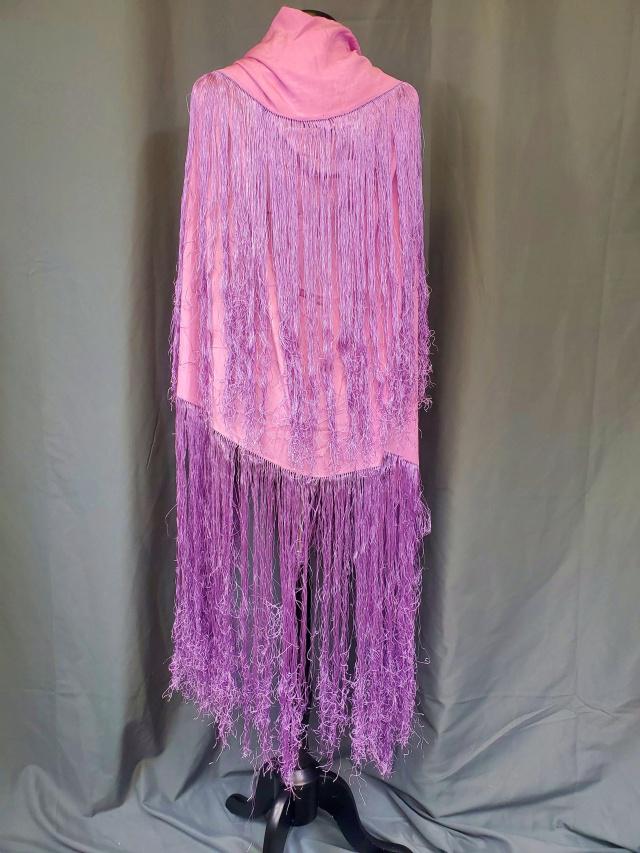 Antique Purple Silk Shawl with Long Fringe: Antique Purple Silk Shawl or Piano Shawl with Long Fringe. Measures 42x44 inches with ana additional 20" long fringe on each side. In good condition, storage fad line going through the center, and a f
