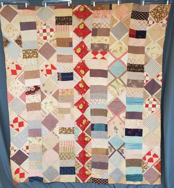 Antique English Scrappy Bars Quilt 1880: Antique 1880s Scrappy Bars Arrangement quilt measuring 75 x 86 inches. Alternating strips of on point framed squares with scrappy rectangles. A thin blanket is the batting, with a fabulous turkey red 