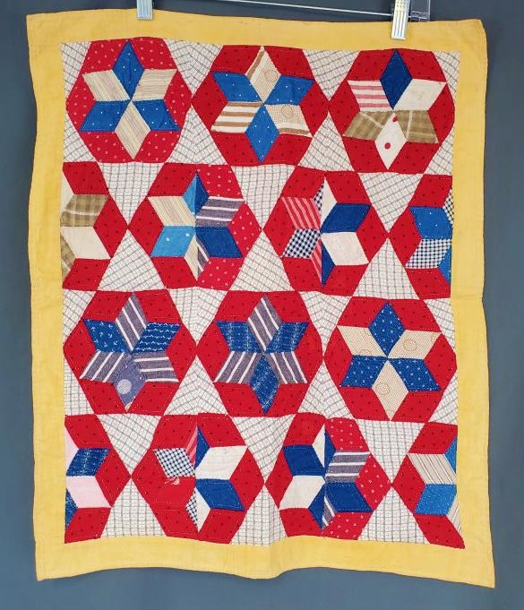 Antique 1900s Patriotic Tumbling Block Doll Quilt: Antique 1900s Patriotic Tumbling Block Doll Quilt measuring 20.5x24.5 inches. Hand and machine pieced, and hand quilted. In very good condition with just a few small spot on a border. We do our best t