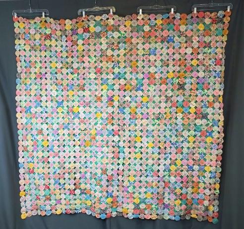 Vintage Yo-Yo Bed Spread Quilt: Vintage c1940s yo-yo bed spread measuring 74 x 78 inches. Comprised of 1332 2 inch yo-yos , set straight 36 x 36. Hand tied onto a Nile green cotton sheet for support. There is no quilting, no batting