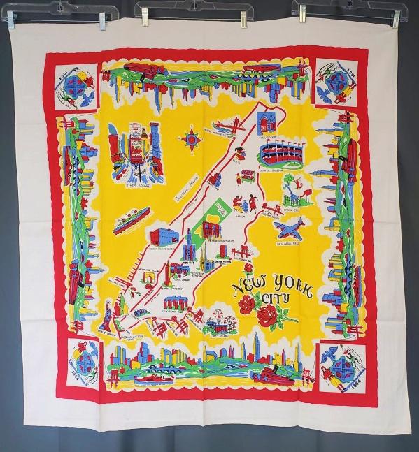 Vintage Printed New York City Tablecloth - Yellow: Vintage printed souvenir tablecloth from New York City with Yellow center and red border, measuring 45x47 inches. Feels like cotton. In very good condition with some small spots.. This item was part o