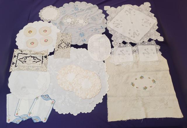 24 Vintage Doilies - Cutwork, Embroidery, more: 24 Vintage Doilies - Cutwork, Embroidery, more. Includes a set of 3 with hand embroidery, a set of 3 with embroidery and Irish crochet, a few larger pieces, and more. All are in good to very good cond