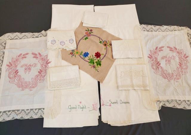 Vintage Sheets and Pillowcase Group: Group with 2 vintage cotton sheets by Canon 72 in Twin Bed, with hand embroidered Good Night - Sweet Dreams on each, 5 single vintage pillowcases, 2 redwork pillow lay overs with the initial W, and a 