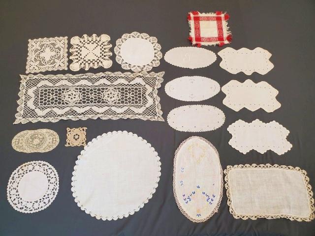 Group of 17 Vintage Doilies: Group of 17 vintage doilies including linen with hand embroidery, lace, bobbin lace, crochet, a monogrammed T, and a turkey red damask. All in good to very good condition. These textiles had been stor
