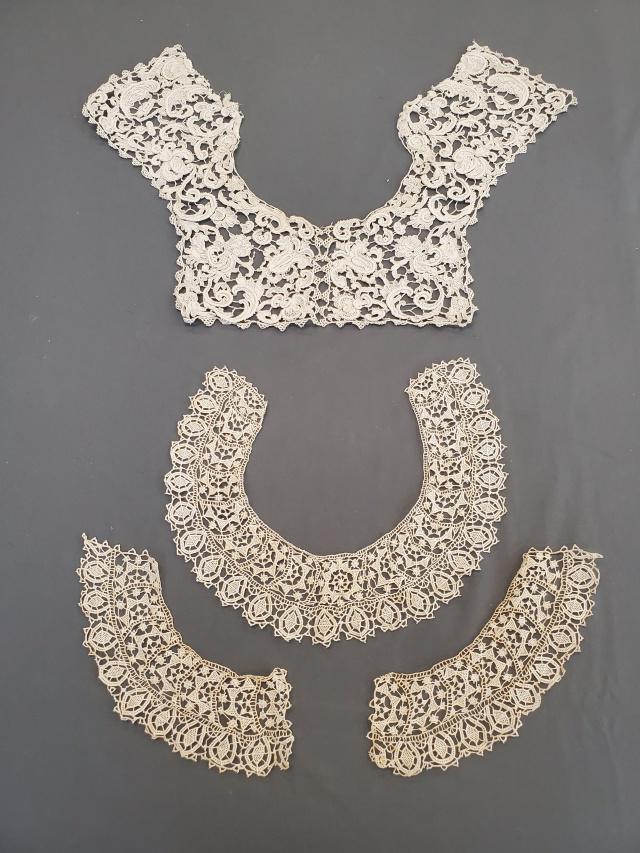 Antique Hand Made Needle Lace Collars, Cuffs: Antique Hand Made Needle lace Collar with Star Design with matching pair of cuffs about 2.75-3 inches wide. In good condition with some age discoloration. Along with a hand made needle lace yoke colla