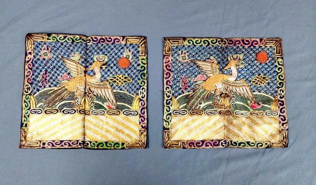 Pair of Chinese Pheasant Rank Badges: Pair of antique 19th century Qing Dynasty Chinese silver pheasant Rank Badges with couched metallic threads, measuring approximately 10 x 9 inches. The silver pheasant signifies the fifth rank of civi