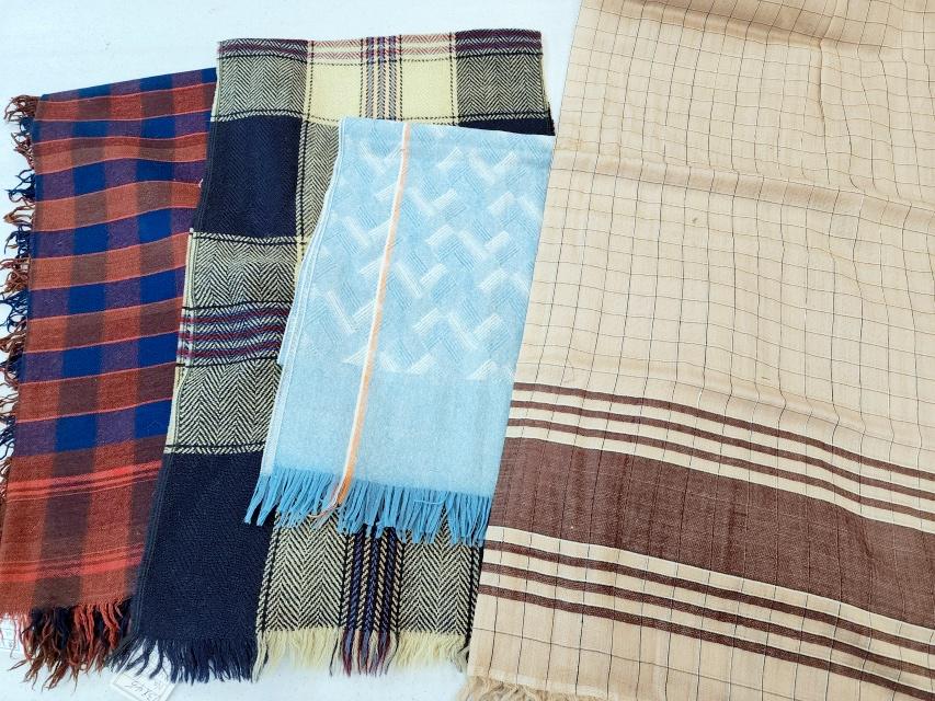 4 Vintage and Antique Wool Scarves: Group includes a 19th century brown wool plaid Shaker shawl, in poor condition with considerable deterioration. A red and blue plaid scarf. A blue wool scarf with a JC Penney Co tag, has small holes. 