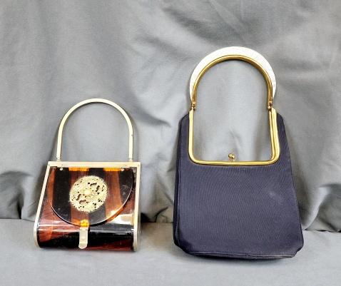 2 Vintage Purses with Lucite - Ingber: Includes Faille purse with brass frame and pearlized Lucite handle by Ingber, includes mirror and change purse. In good condition with small mark on the frame; along with tortoise shell Lucite purse w