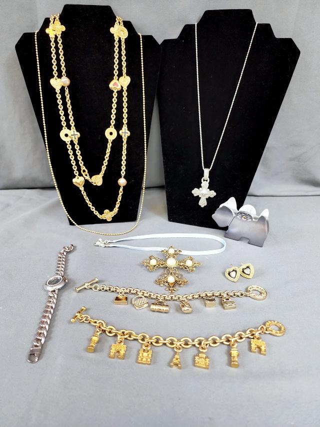 Agatha Paris Costume Jewelry Group: Agatha Paris Costume Jewelry Group includes 2 charm bracelets, a cross pin with pearls, a simple blue ribbon necklace, a pair of heart pierced earrings, a Silver toned cross on a chain, a gold tone ch