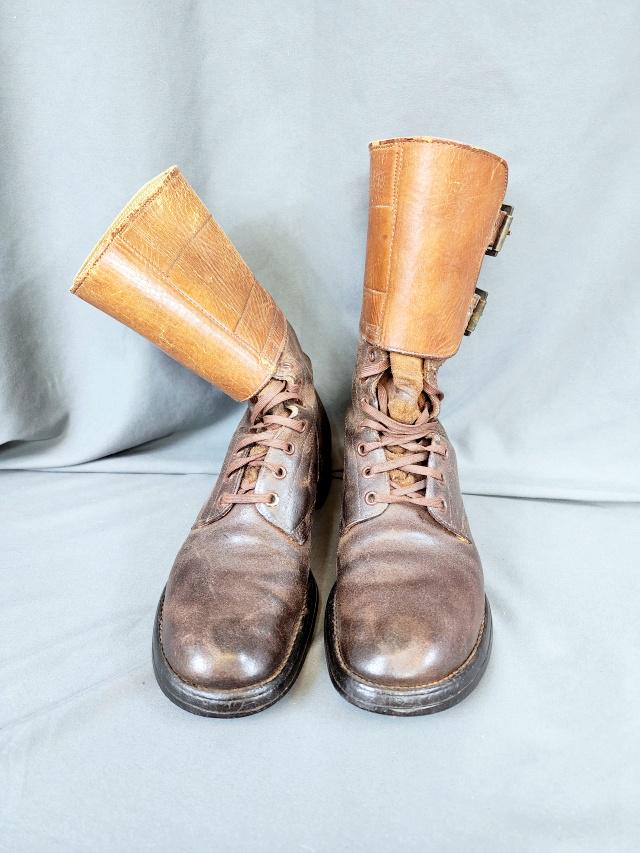 Vintage Panco Military Boots: Vintage Brown Leather Military Boots, marked Panco on the bottom. Two buckles on one of each. Laces are intact. No other marks or sizes observed. Both have shoes stretchers included, as found. Bottom 