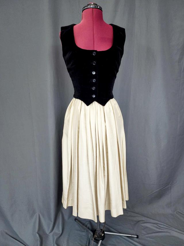 Vintage c1960s Anne Fogarty Silk Velvet Dress: Vintage c1960s Anne Fogarty NY Gold Silk Dress with Black Velvet Vest and silk lining. Flattering A Line Shape. Dress has spaghetti straps and side zipper. Measures laying flat 16b, 14w, and roomy hip