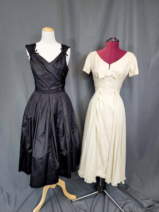 2 Vintage Party Dresses - Saks, Edward Albert: 2 Vintage Party dresses includes a black satin A line dress, sleeves with narrow bow, sweetheart neckline, and back zipper. Tag is by Saks Fifth Avenue. Measures flat 16b, 13w, roomy in the hips. In v