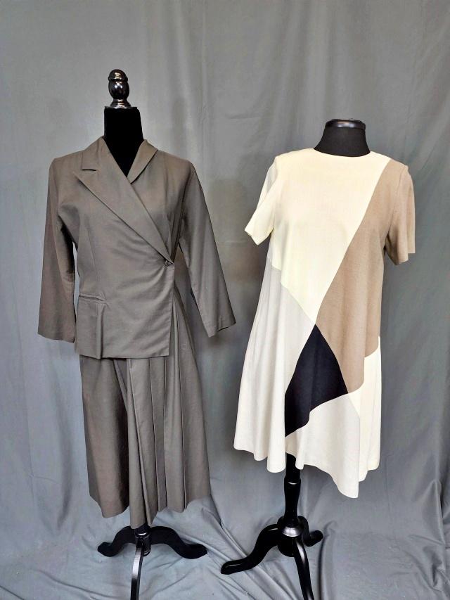2 Vintage Dresses - Fujiwara, Stolman: 2 Vintage Dresses including dark grey by Guiliano Fujiwara. A unique Fujiwara Dress that is asymmetrical in the collar, the jacket and the skirt. Only the sleeves are symmetrical. Tag states medium 42