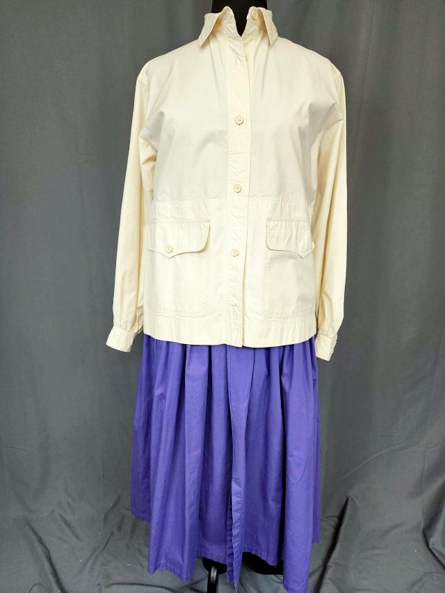 Vintage Saint Laurent Skirt with Blouse: 2 Vintage circa 1970s Garments by Eve Saint Laurent. Includes a cream colored button down shirt or jacket cotton. Measures flat 21b 18 across the shoulders. In good condition with a small spot. Along 