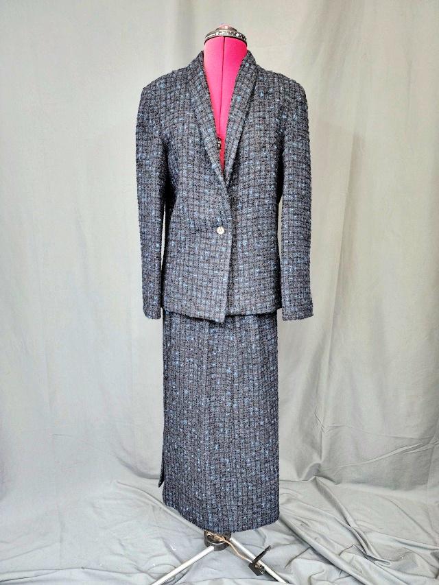Vintage Brooks Brothers Ladies Wool Suit: Vintage Brooks Brothers Ladies Wool Suit in blue and grey. Skirt measures flat 13w 32 inches long. Jacket has a single button closure and measures 16 inches across the shoulder, 22 inches down the arm