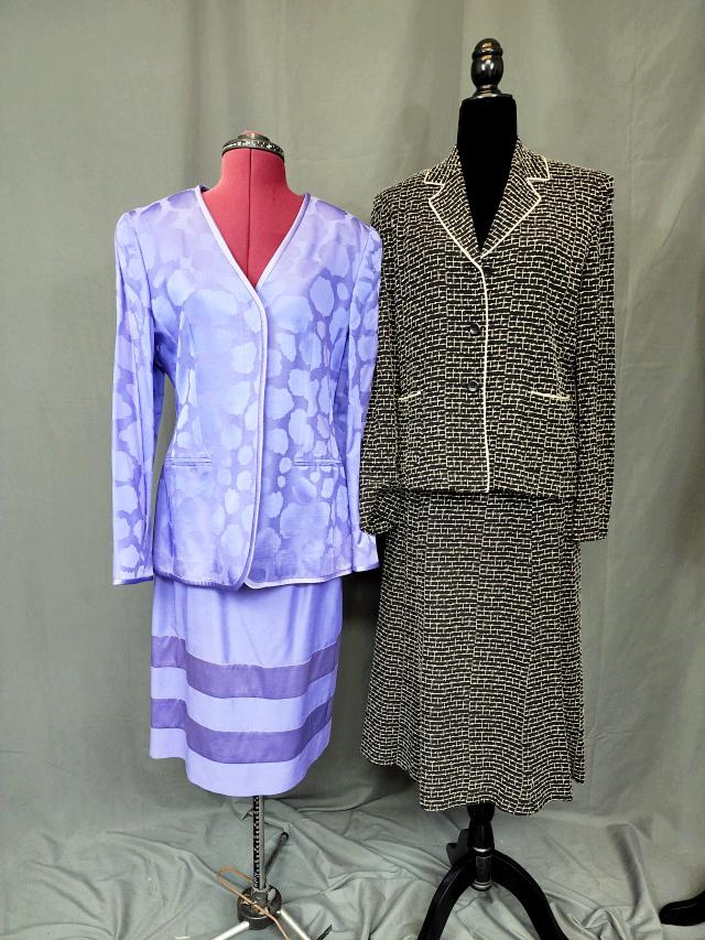 2 Ladies Skirt Suits - Max Mara, Louis Feraud: 2 ladies skirt suits including jackets and skirts. Purple by Louis Feraud, acetate/viscose blend. Jacket has hidden button closures, 2 faux pockets in the front. Size 10 on both jacket and skirt. Blac