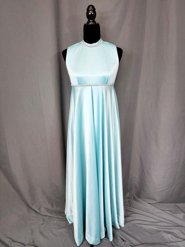 Vintage Aqua Pants Suit with Rhinestones: Vintage aqua pants suit with empire waist and rhinestone embellishment along the collar and waistline, feels like a polyester, but there are no tags, measures flat 17b 16w and roomy at the hips, in go
