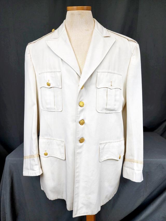 Vintage Men's Navy Uniform Dress Coat: Vintage men's Navy uniform dress jacket, measures 20 inches across the shoulders, 33 inches longs, and 25 inch sleeves, tag inside reads "Made to Order by Becker Uniforms, Columbus, California." Insid