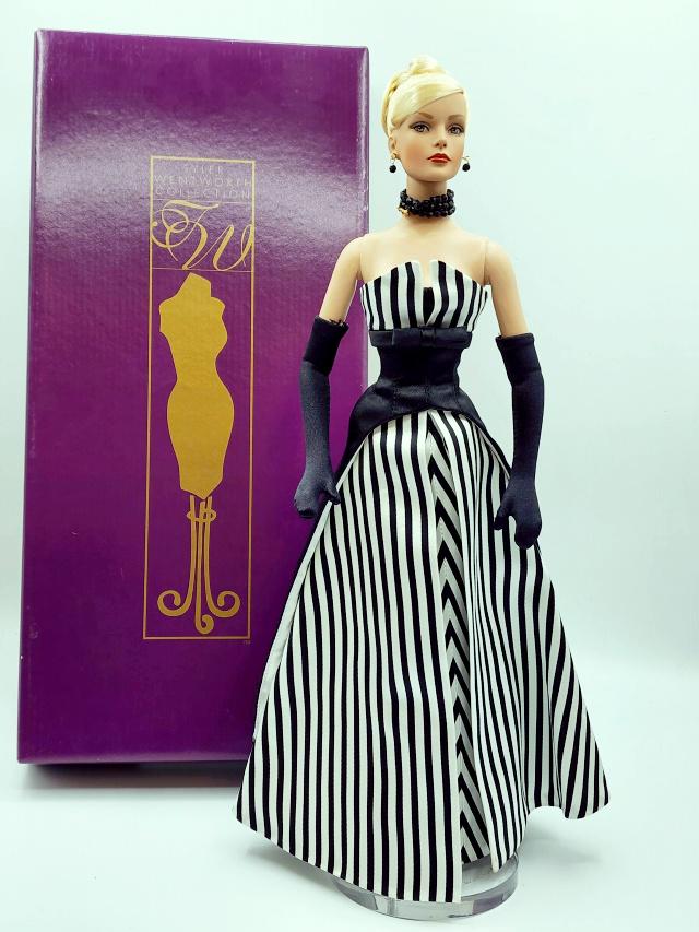 Tonner Tyler Wentworth Black and White Ball Sydney: Tonner Tyler Wentworth Black and White Ball Sydney TW3102 doll with bendable arms, black and white gown, gloves, earrings, choker necklace, panty hose, and shoes, stand and original box. These dolls h