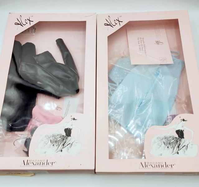 2 Madame Alexander Alex Outfits in Boxes F: 2 Madame Alexander Alex Outfits in Boxes Group F includes Dinner and a Movie and Atlantico. These doll items have been gently played with, redressed, and displayed behind glass in a smoke free and pet