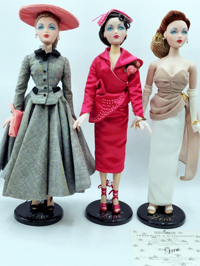 3 Ashton Drake Gene Dolls in Boxes Group B: 3 Ashton Drake Gene Dolls in Boxes Group B. Includes Love Paris (with COA), Everything Is Coming Up Roses (with COA), and Iced Coffee (with COA). Please see all photos for what is included for dolls a