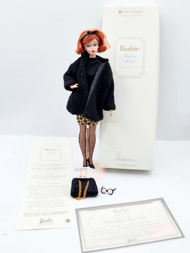 Barbie Silkstone Fashion Editor Barbie Doll: Barbie Silkstone Fashion Editor Barbie Doll, appears to be complete, in original box with COA. These dolls have been gently played with, redressed, and displayed behind glass in a smoke free and pet f